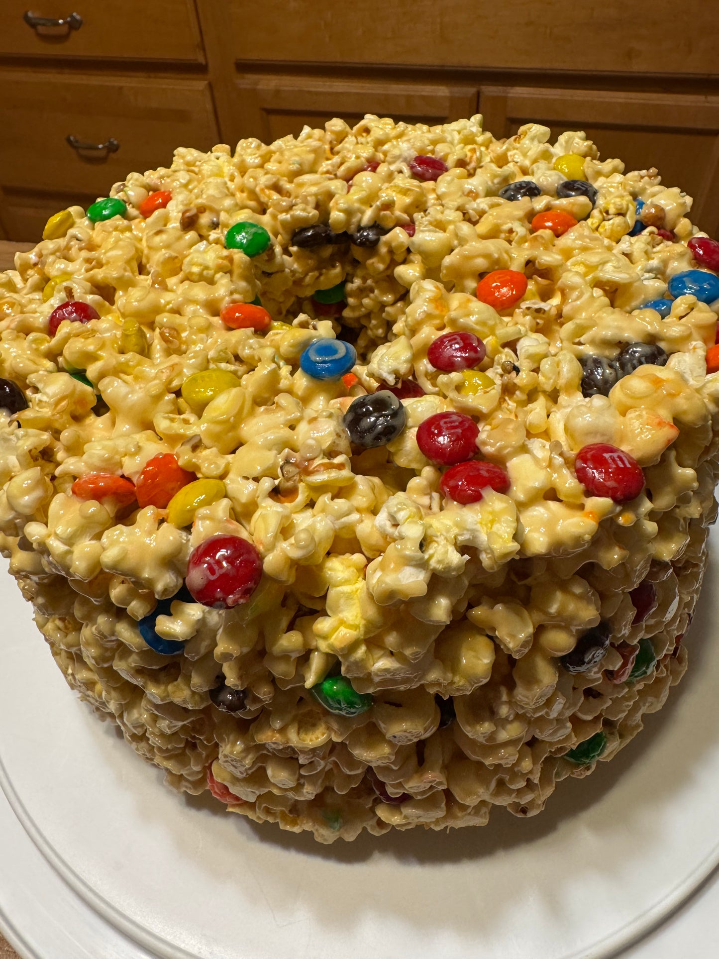 Carmel Popcorn Cake with M&Ms